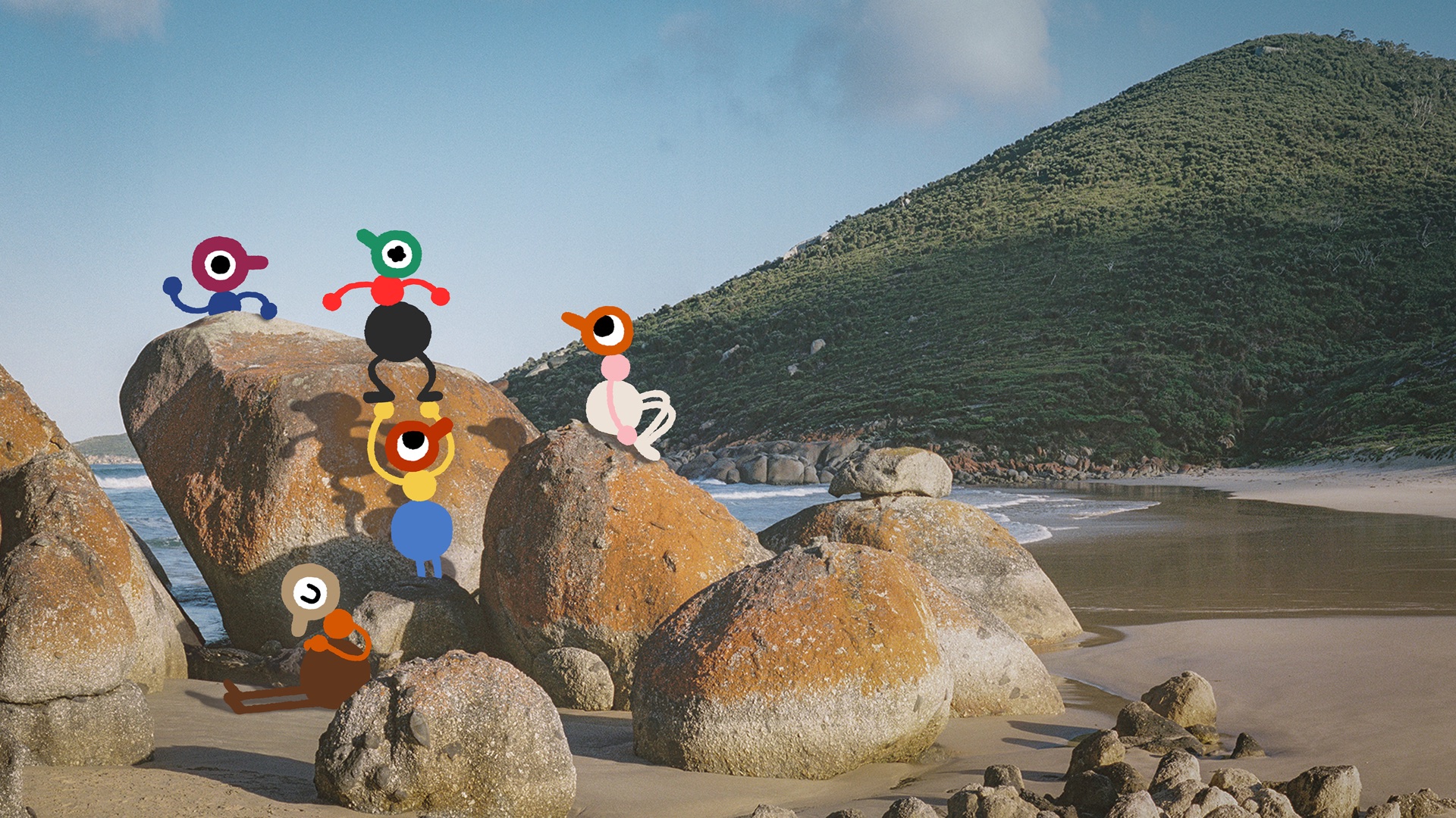 Big Walk players crossing a rocky island coastline